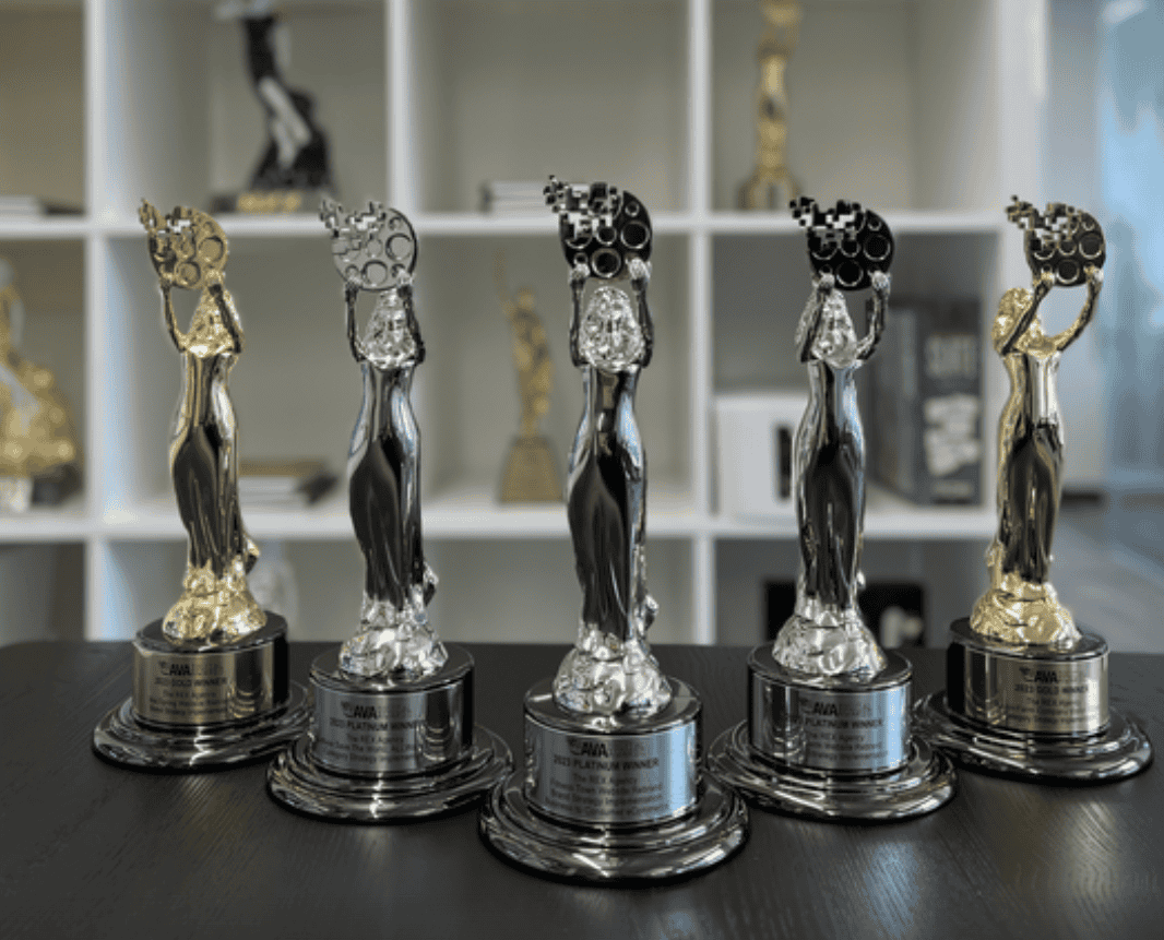 REX Awards Haul 2023 Five agency award statuettes