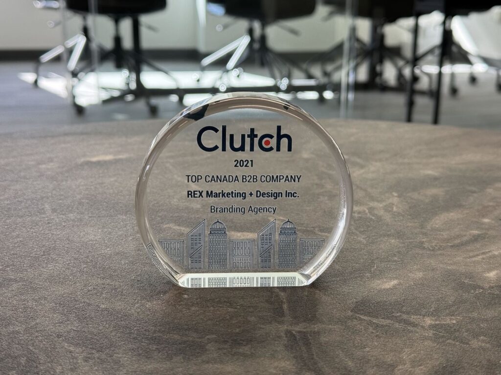 An image showing REX agency's Clutch best branding agency award trophy